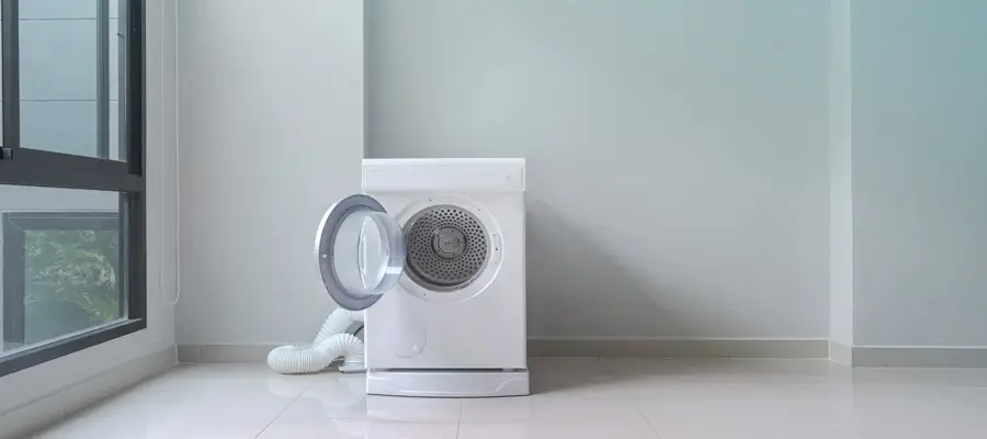A washer in a laundry room
