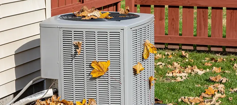 Air conditioner clogged by leaves